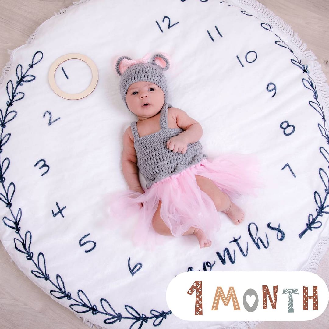 1-month-old baby milestones during tummy time development, early baby growth and motor skills